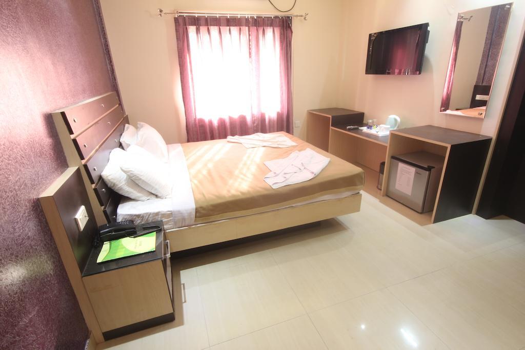 Urmee Hotel บูบันเนสชวาร์ ห้อง รูปภาพ